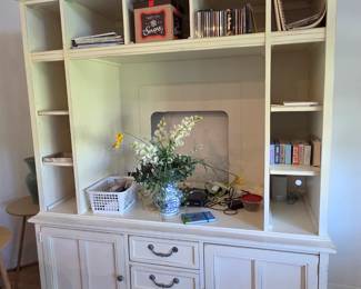 Entertainment center: 67in wide X 27.25in deep X 83.25in tall