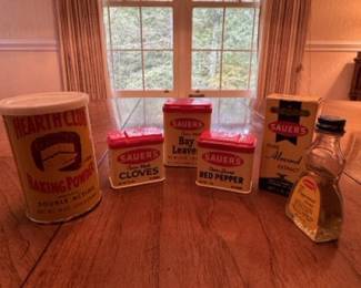 Assorted vintage spice and extract containers for decor