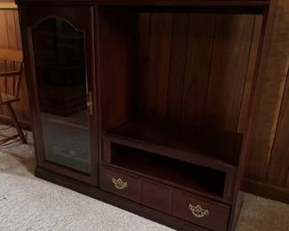 Cherry finish tv cabinet with glass door