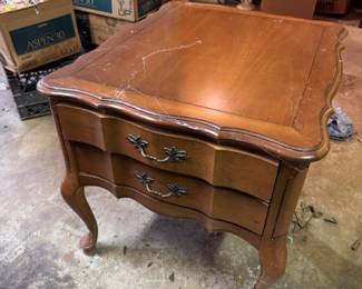Side table with scalloped edges