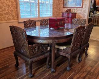 Ornate Chinese carved top table and chairs