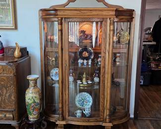 Stunning antique lighted curio display cabinet and antiques