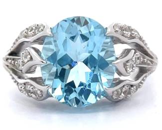 4.71 Carat Oval Blue & White Topaz Flower Ring