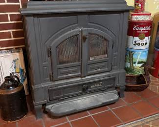 Wood burning stove,,,,you will have to remove it.
