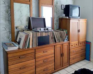 Midcentury Bedroom Furniture. There is also a matching night stand. More record albums.