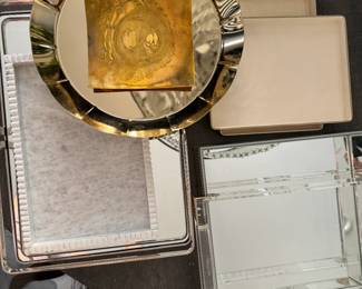 multiple decorative trays, mirrored, stone, brass, chrome