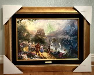 Lot #124 Thomas Kinkade GicleeDorothy Discovers the Emerald City Limited Edition Giclee Painting Wizard of Oz 18x27 Gold Framed Thomas Kinkade Dorothy Discovers the Emerald City Limited Edition Framed Canvas Print