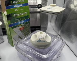 Lot #246 FoodSaver Vacuum Sealer System with Stainless Steel Design and Vacuum Storage Containers Plus Freezer Quart Bags