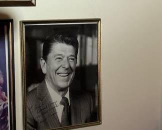 Ronald Reagan Signed Portrait
Framed black-and-white signed photograph of Ronald Reagan with a personalized inscription. A remarkable collector’s piece capturing the charisma and legacy of an American president.