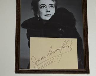 Framed Joan Crawford Autograph & Portrait
Elegant framed display featuring Hollywood legend Joan Crawford’s bold hand-signed autograph with a classic black-and-white portrait. A stunning collectible piece of Golden Age cinema history—authentic vintage signature in excellent condition.