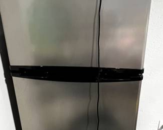 Small Apartment size Frigidaire  refrigerator/top freezer…bought at Costco for the Bldg & didn’t use 