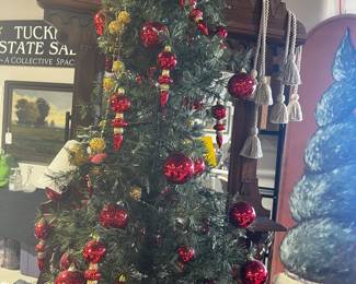 Small Faux Tree w/many red ornaments