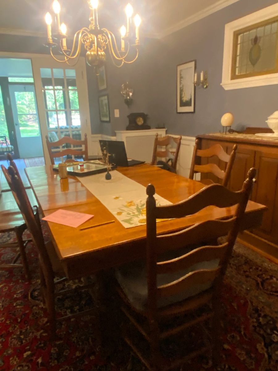 Dining room table and 8 chairs (not all chairs are shown in photo).  Table can be as small as 42" long x 43" wide and can expand to 9' long.