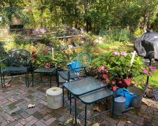 4 chairs and 4 side tables, pottery crocks, watering cans, planters with plants, pellet smoker and grill, etc.