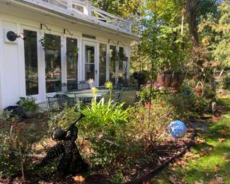 Plants in planters and garden ornaments