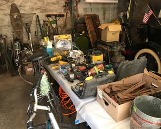 2 Bikes, ice fishing implements, tools, blades, etc.