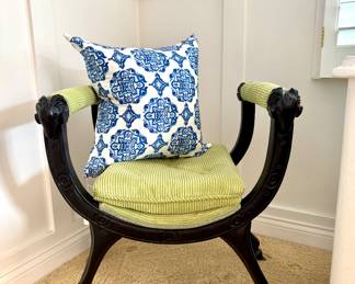 $400/ each. Two avail. Curule bench with ram head and hoof accent; $28 - blue and white pillow - 20x18