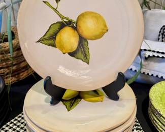 $80 - Set of 8 Magenta exclusive lemon -11.5 dinner plates. Shows wear and a few chips as shown in the image.