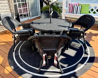 $600 - 5 piece Jeco dining set with umbrella and stand (umbrella needs cleaning) - 43 x30; $20 - Black and white outdoor rug