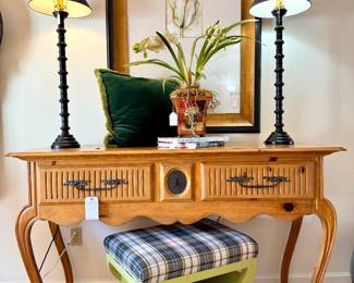 $800 - Milling Road of Baker Furniture Pine Console Table (currently on Chairish for $2695)-62x21x37; $40 (each) - Black buffet lamp (2 available)- 38h; $68- Faux Flower in pot; $200 - “Fluid Beauty” framed - 36x48; $48- Custom initial pillow "O"; $200 - Footstool ottoman with plaid cushion - 25x19x19