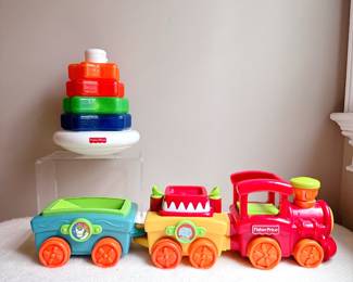 fisher price peek a blocks press and go train and fisher price sparkling symphony stacker