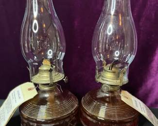Pair Of Ribbed, Amber Colored Glass Base Hurricane Lamps With Clear Glass Chimneys