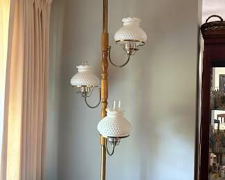 Lamp is floor to ceiling, plug in and works great!!