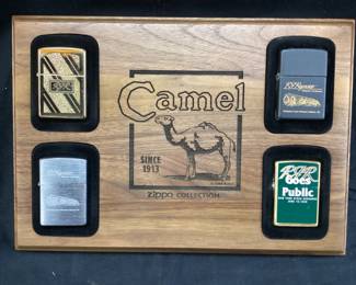 4 ZIPPO RJR TOBACCO CAMEL LIGHTERS IN WOOD CAMEL DISPLAY