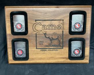 (4) 1994 ZIPPO WINSTON MOTORSPORTS RAISED LOGO LIGHTERS IN CAMEL ZIPPO DISPLAY