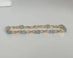 10K Gold with Blue Topaz Stones Link Design Bracelet - 7" (5.9 Grams TW)