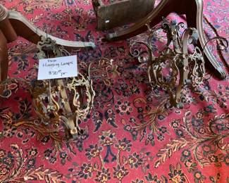A pair of rod iron, hanging light fixtures just came out of the attic today