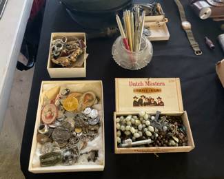 Box full of religious medals, and rosaries