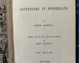 Two antique Lewis Carroll classics — Alice’s Adventures in Wonderland (1893) and Through the Looking-Glass (circa 1891), both illustrated by John Tenniel. Original gilt-decorated red and blue cloth covers. Printed in New York by Macmillan.