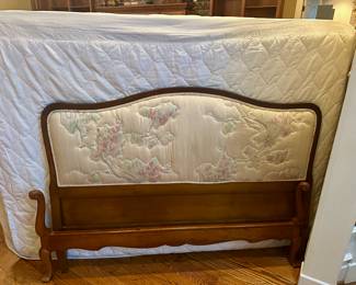 Full Size Bed. Includes headboard, footboard, side rails, box spring, mattress, and bed skirt. 