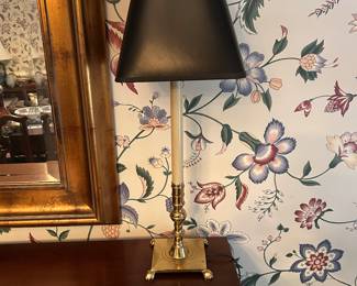 a pair of brass candelabra lamps.