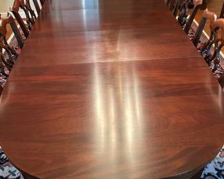 Craftique dining room table with 3 leaves.