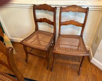4 of these vintage cane chairs.