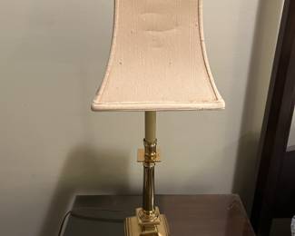 a pair of brass laamps.