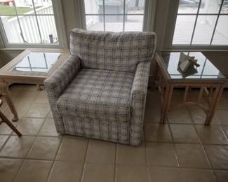 End table; upholstered chair; rattan end table