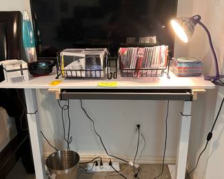 electrically adjustable height office