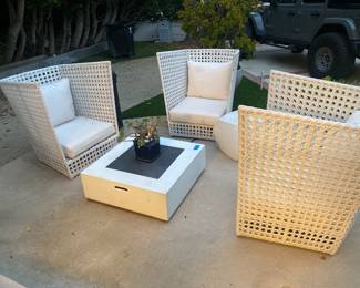 Three matching oversized, patio chairs, fire table