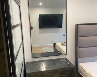 Metal framed mirror
65”x 35.5””