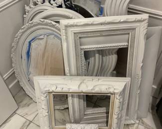 Painted white frames and mirrors
