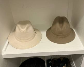 The bottom, black leather hat is an American bison Henschel, dude hat