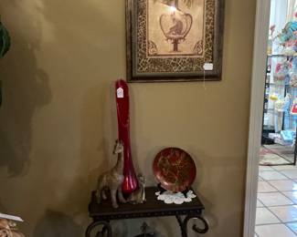 There are giraffes, also pictured is a ruby, red Viking swung vase. Mid-century modern