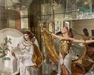 These dolls are from the Franklin mint collection each one dipped in 24 karat gold