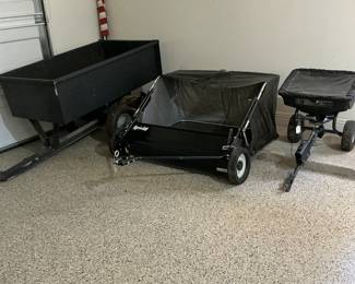 Here we have a trailer car, a leaf catcher and a seed cart all fairly new