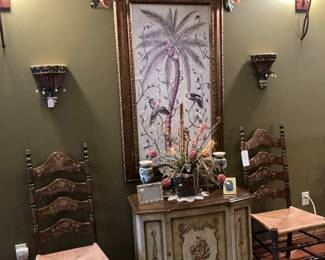 The center cabinet is actually a Magnavox stereo system from the 70s and it does work next to it or two matching ladderback chairs from the 70s