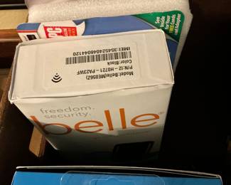 The box contains Fitbit bail security Wi-Fi adapters