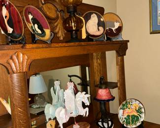 The cats plates are all Franklin mint in the center is an amber all lamp